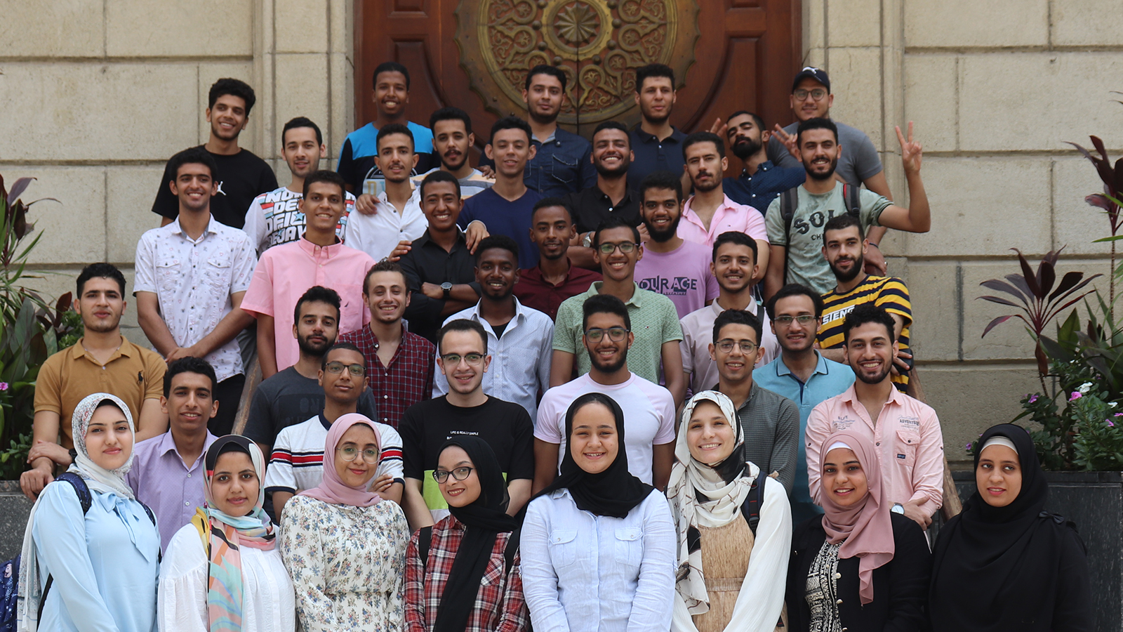 Group of students smiling at univeristy
