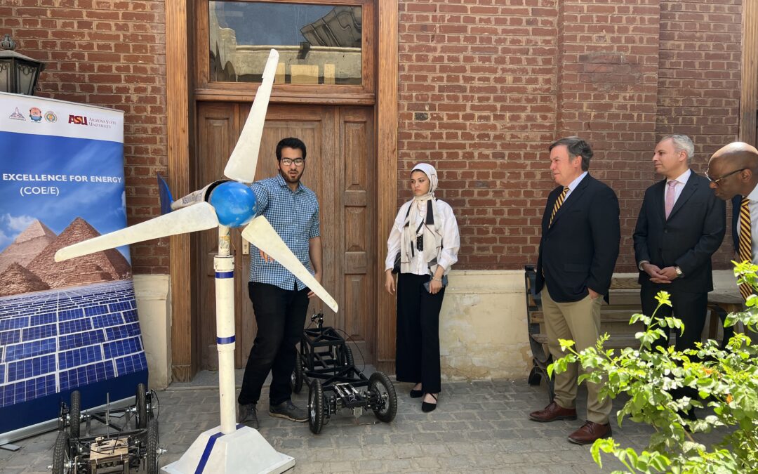 ASU president listens as students present wind energy project